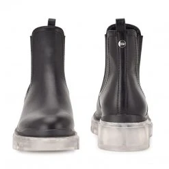 Nine West Abra Chelsea Lug Sole Booties In The Clear