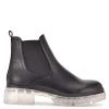 Nine West Abra Chelsea Lug Sole Booties In The Clear